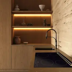 Nowoczesna kuchnia z drewnianymi frontami i płytą indukcyjną. Czy warto inwestować w inteligentne gadżety do kuchni smart home?
